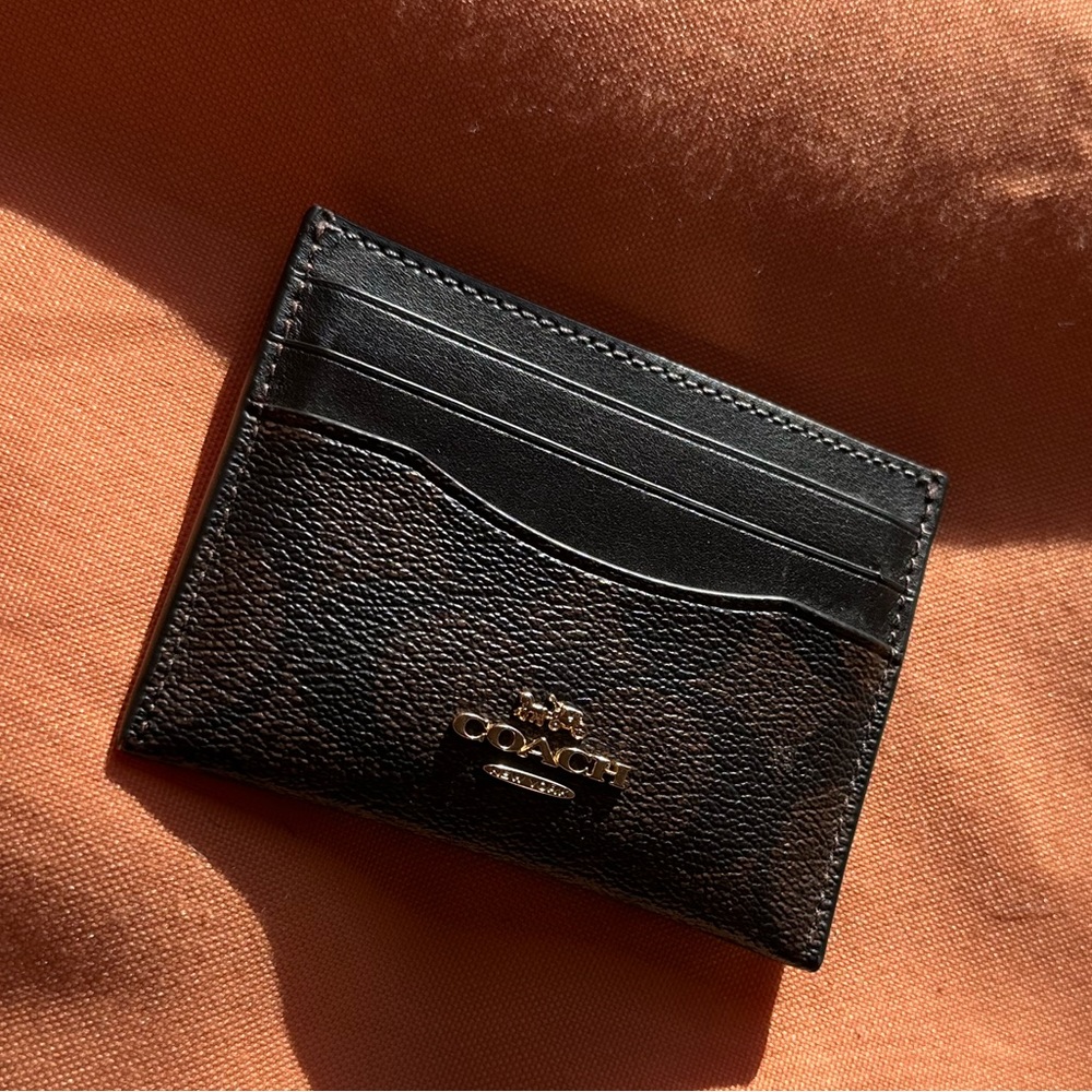 Brown leather, gold emblem